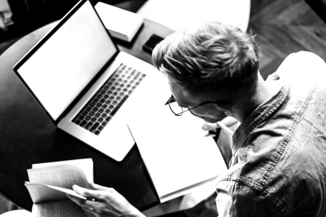 Instructor providing hands-on network support guidance during a live session